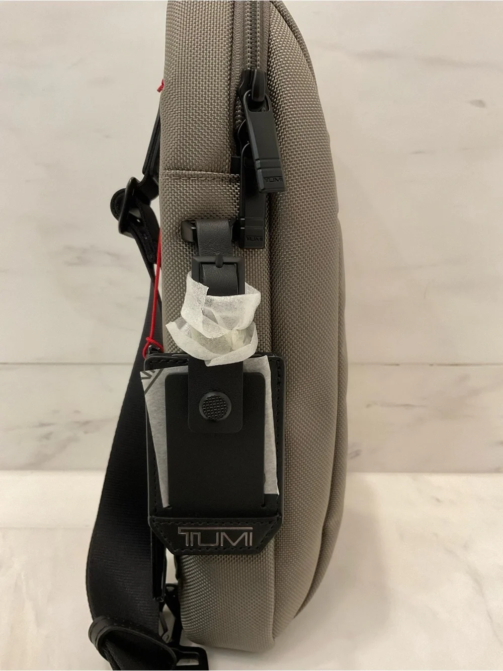 Tumi up sale